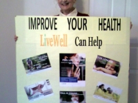 WCV-Jo-with-her-LiveWell-information-poster